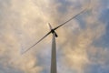 Wind turbine on a cloudy day Royalty Free Stock Photo