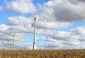 Wind turbine electrical generator infield Royalty Free Stock Photo