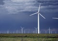 Wind turbine energy from a modern windmill generating electricity, clean energy wind power on the plains of Colorado