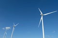 Wind turbine farm in the field - a renewable energy source Royalty Free Stock Photo