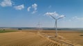 Wind turbine farm over the blue sky Royalty Free Stock Photo