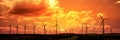 Wind turbine field at sunset dramatic sky