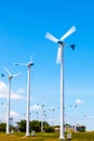 Wind turbine generator and blue sky background Royalty Free Stock Photo