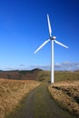 Wind turbine with gravel path Royalty Free Stock Photo