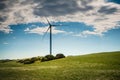 Wind turbine on a green field