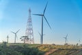 Wind Turbine on Hill, green energy. wind turbine with electric pole on hill