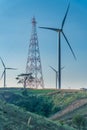 Wind Turbine on Hill, green energy. wind turbine with electric pole on hill