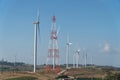 Wind Turbine on Hill, green energy. wind turbine with electric pole on hill