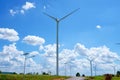 Wind turbine renewable energy source summer with blue sky Royalty Free Stock Photo