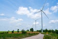 Wind turbine renewable energy source summer with blue sky Royalty Free Stock Photo