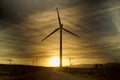 Wind turbine silhouette at sunset Royalty Free Stock Photo