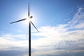 Wind turbines against blue sky. Alternative energy source Royalty Free Stock Photo