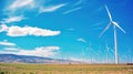 wind turbines against a beautiful blue sky, harnessing wind energy