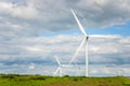 Wind Turbines against Cloudy Sky Royalty Free Stock Photo