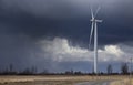 Wind turbines with an approaching spring storm on Wolfe Island, Ontario Royalty Free Stock Photo