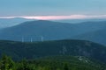 Wind turbines in Bear mountain , view from upper water reservoir of the pumped storage hydro power plant Dlouhe Strane in Jeseniky Royalty Free Stock Photo