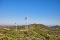 Wind turbines on beautiful sunny summer mountain landscape Royalty Free Stock Photo