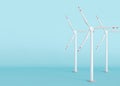 Wind turbines on blue background with copy space for text. Wind turbine generating electricity. Global ecology. Clean