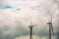 Wind turbines with blue sky and cloud,Wind power station. Ecological energy composition Royalty Free Stock Photo