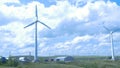 Wind turbines farm. aerogenerator windmill in sunny blue sky day. Wind Turbine.