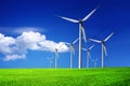 Wind turbines farm on blue sky Royalty Free Stock Photo