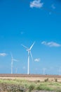 Wind turbines farm on cotton field at Corpus Christi, Texas, USA Royalty Free Stock Photo