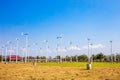 Wind turbines farm eco field in bright day with blue sky background at Chang Hua Man Royal Projects Royalty Free Stock Photo