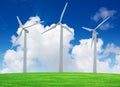 Wind turbines farm on green field Royalty Free Stock Photo