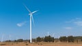 Wind turbines on farmland, renewable energy, Royalty Free Stock Photo