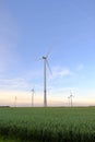 Wind turbines in field. Natural energy.Environmentally friendly natural energy . Wind energy day holiday. Royalty Free Stock Photo