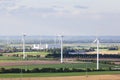 Wind turbines in flat landscape Royalty Free Stock Photo