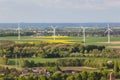 Wind turbines in flat landscape Royalty Free Stock Photo