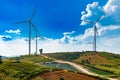 Wind turbines Geneating Clean Energy and Electricity in Blue Sky, Thailand Royalty Free Stock Photo