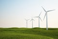 Wind turbines on green grass field