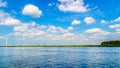 Wind Turbines, the modern Windmills, in a Wind Farm along the Shore of Veluwemeer Royalty Free Stock Photo