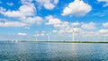 Wind Turbines, the modern Windmills, in a Wind Farm along the Shore of Veluwemeer Royalty Free Stock Photo