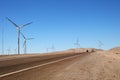 Wind turbines next to the road, Calama, Chile Royalty Free Stock Photo