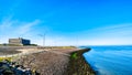 Wind Turbines at the Oosterschelde inlet at the Neeltje Jans island at the Delta Works Storm Surge Barrier Royalty Free Stock Photo