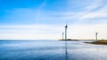 Wind Turbines at the Oosterschelde inlet at the Neeltje Jans island at the Delta Works Storm Surge Barrier Royalty Free Stock Photo