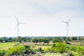 wind turbines or power plant on top of hill - concept of eco friendly, renewable energy and technology. Royalty Free Stock Photo