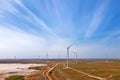Wind turbines producing alternative green energy Royalty Free Stock Photo