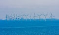 Wind turbines in sea in Copenhagen, Denmark. Offshore wind farm for renewable sustainable and alternative energy production. Green