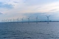 Wind turbines in sea in Copenhagen, Denmark. Offshore wind farm for renewable sustainable and alternative energy Royalty Free Stock Photo