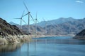 Wind Turbines Spin Efficiently near Mountainous Reservoir, Generating Clean Energy for a Sustainable Future