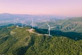 Wind turbines spinning in the wind energy station in mountain