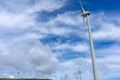 Wind turbines stand tall against a cloudy sky on Terceira Island, Azores. Royalty Free Stock Photo