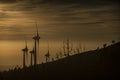 Wind turbines Sunset in the mountains Royalty Free Stock Photo