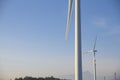 Wind turbines at sunset. Production of clean and renewable energy. Trentino, Italy Royalty Free Stock Photo