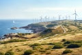 wind turbines on the top of a hill with the sea in the background, View from Cape Kaliakra to an offshore wind farm in Bulgaria,