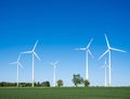 wind turbines under blue sky in german saarland in spring Royalty Free Stock Photo